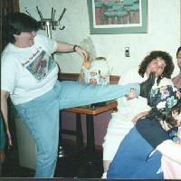 July 1996.  Denise with a foot in her mouth, clowning around and having a good time.