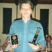 Al D with awards for second in low scores and third in individual points.