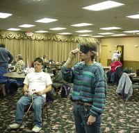 Kim throwing, Joe D watching, 2004 tournament
